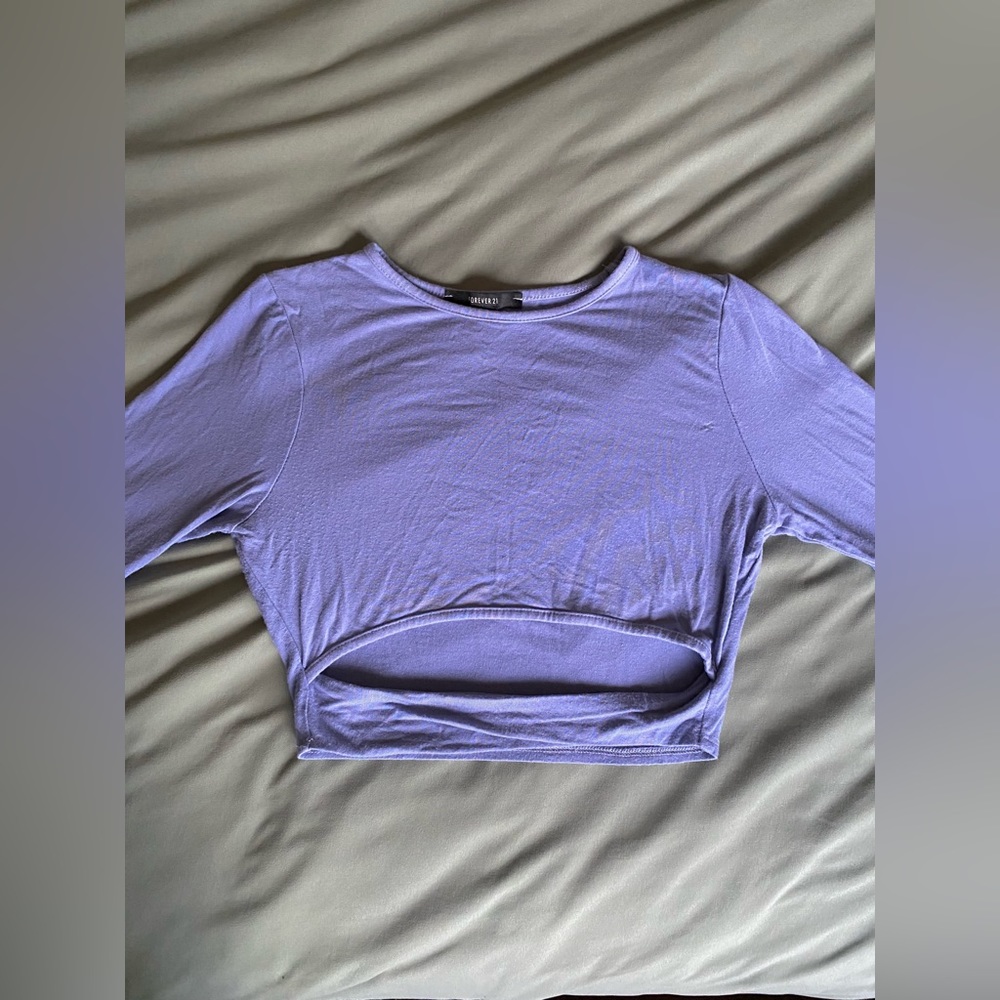 Forever 21 form fitting cropped light blue long sleeve in a women’s size small.
